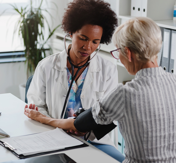 A woman doctor checking a patient