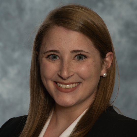 a woman smiling for the camera