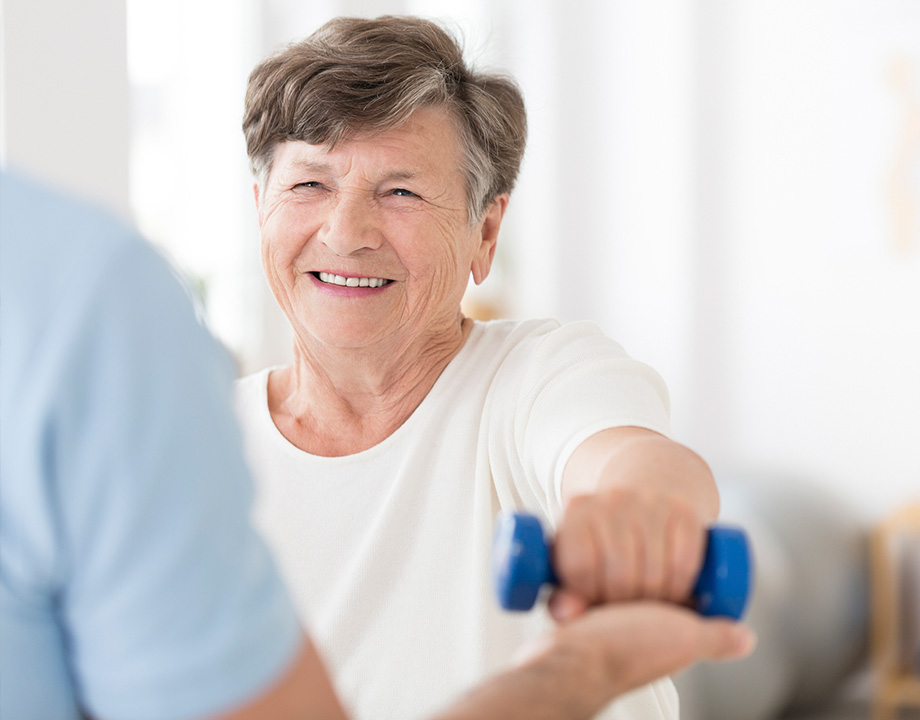 woman doing exercise for shoulder pain